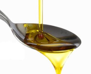 cuchara con aceite de oliva